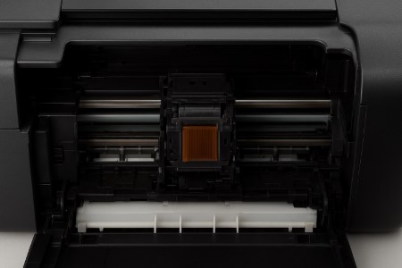 End Canon 6000 Pain - 4 Effortless Carriage Fixes 5 Technician fixing Canon 6000 error by cleaning carriage assembly