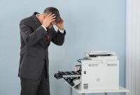 imgi 17 businessman looking printer machine office 1016675 3676