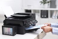 imgi_26_woman-using-modern-printer-workplace-indoors-closeup_495423-97611 imgi 26 woman using modern printer workplace indoors closeup 495423 97611